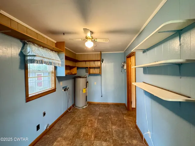 a view of a hallway with a window