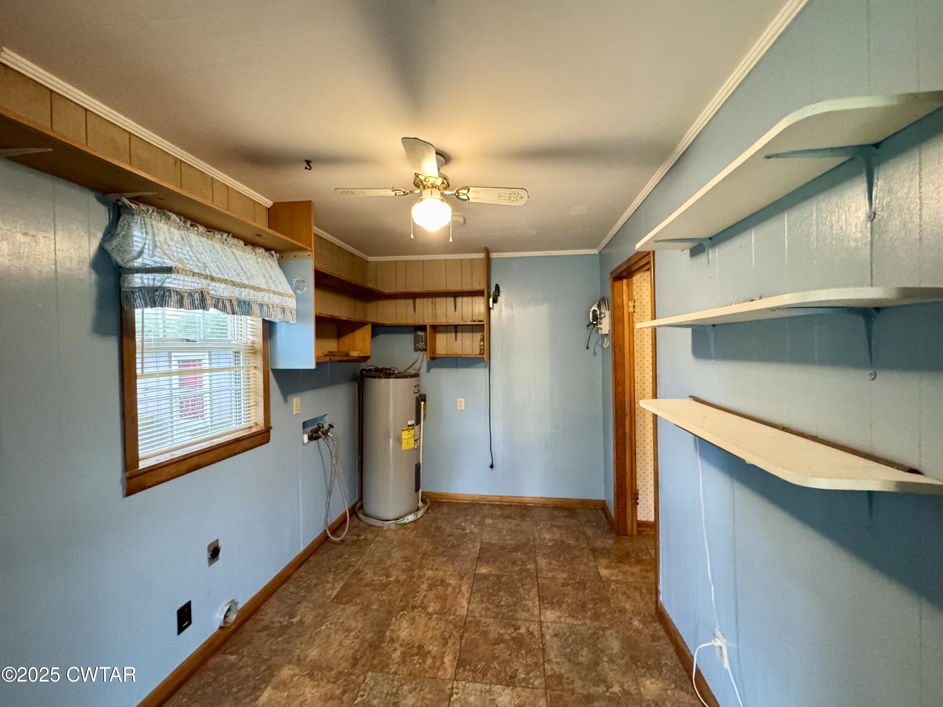4985 McClard Road Union City, TN 38261 - Photo 9 of 27 a view of a hallway with a window