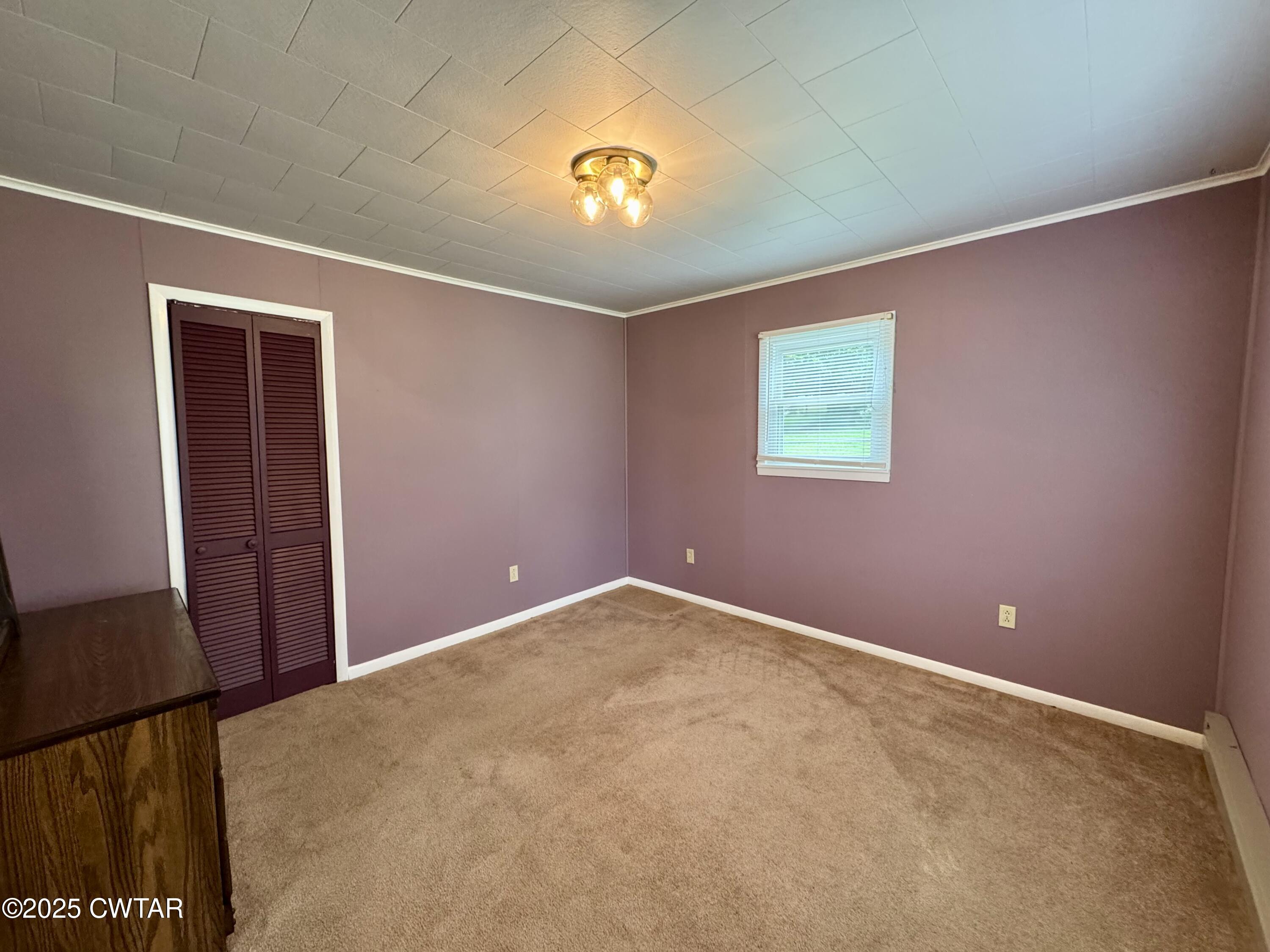 4985 McClard Road Union City, TN 38261 - Photo 10 of 27 an empty room with windows