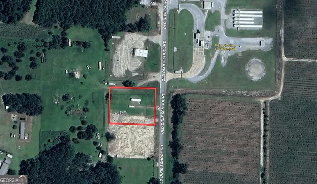 an aerial view of multi story residential apartment building with yard