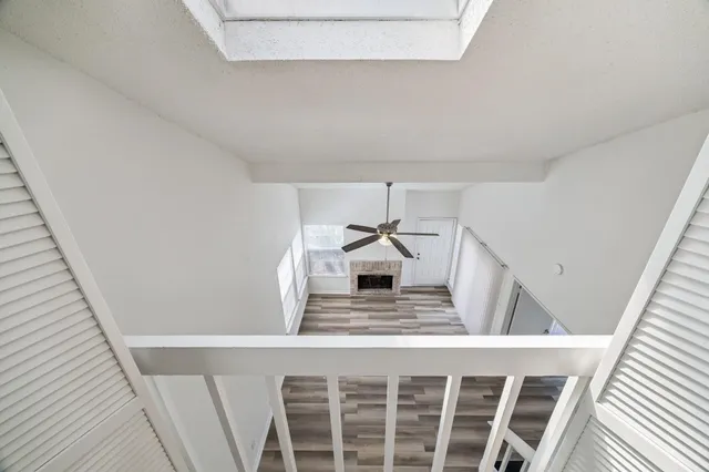 a view of a hallway to a house