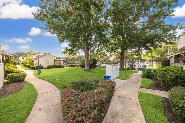 a group of cars parked in a parking lot