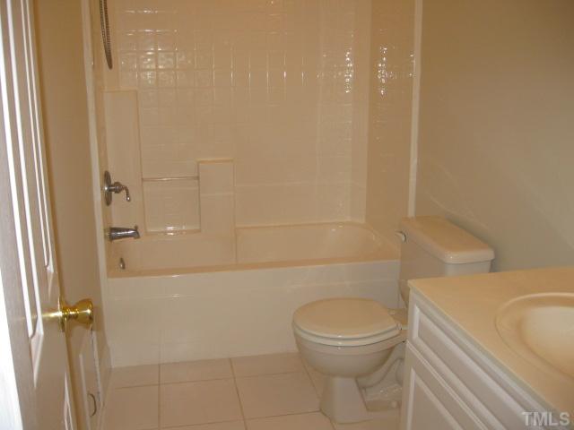 3709 Barwell Road Raleigh, NC 27610 - Photo 12 of 25 a bathroom with a toilet and a shower