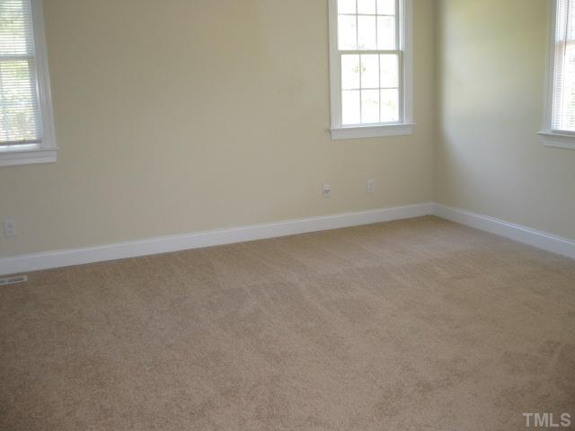 3709 Barwell Road Raleigh, NC 27610 - Photo 13 of 25 an empty room with a window