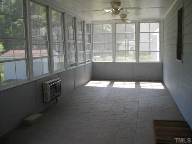 3709 Barwell Road Raleigh, NC 27610 - Photo 3 of 25 a view of an empty room with a window