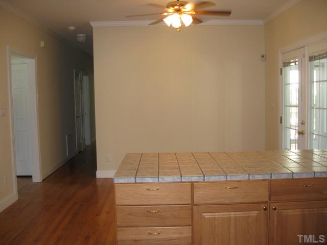 3709 Barwell Road Raleigh, NC 27610 - Photo 9 of 25 a view of an empty room and wooden floor
