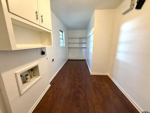 a front view of a house with swimming pool having outdoor seating