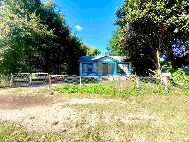a house view with a garden space