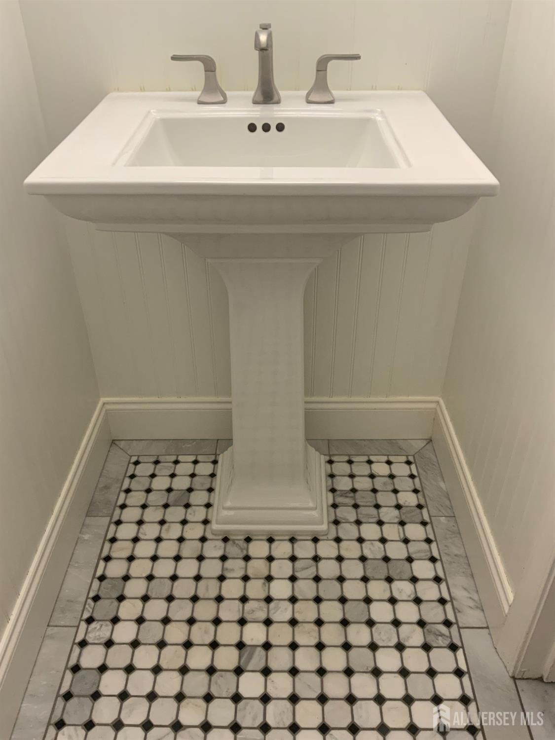 52 Wexford Drive Monmouth Junction, NJ 08852 - Photo 20 of 52 a bathroom with a sink and a mirror