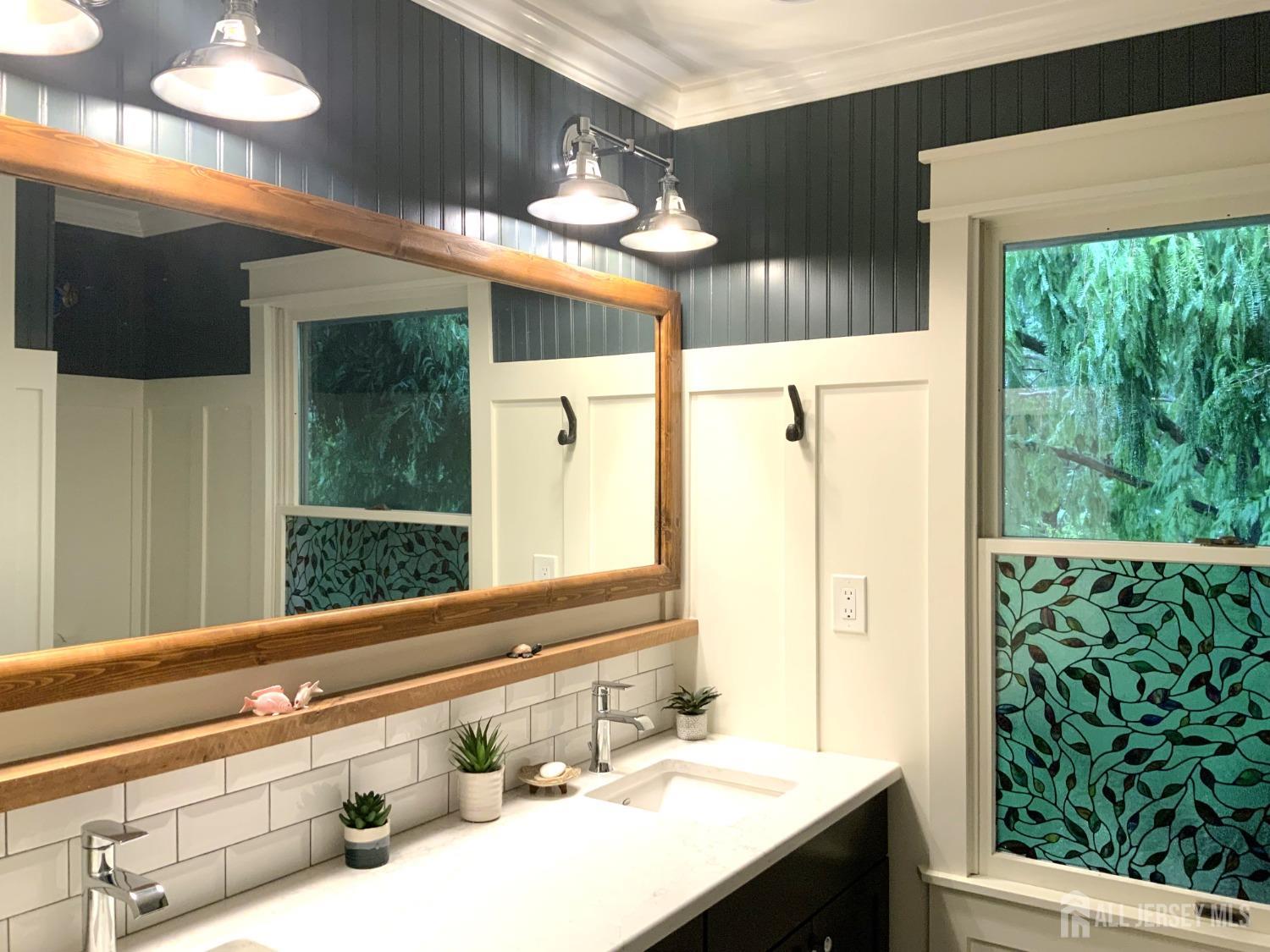 52 Wexford Drive Monmouth Junction, NJ 08852 - Photo 26 of 52 a bathroom with a sink and a mirror