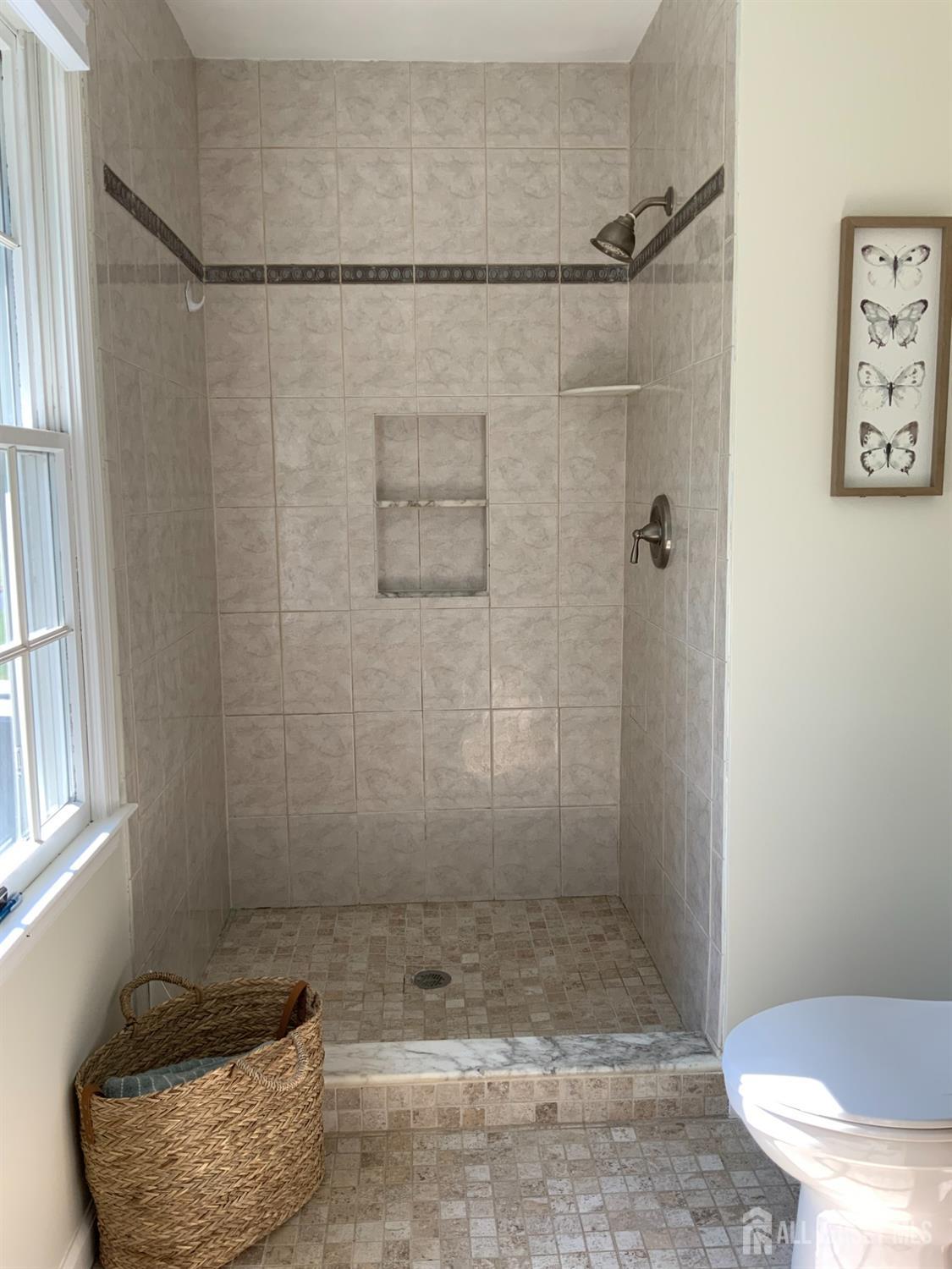 52 Wexford Drive Monmouth Junction, NJ 08852 - Photo 33 of 52 a bathroom with a granite countertop shower and a sink