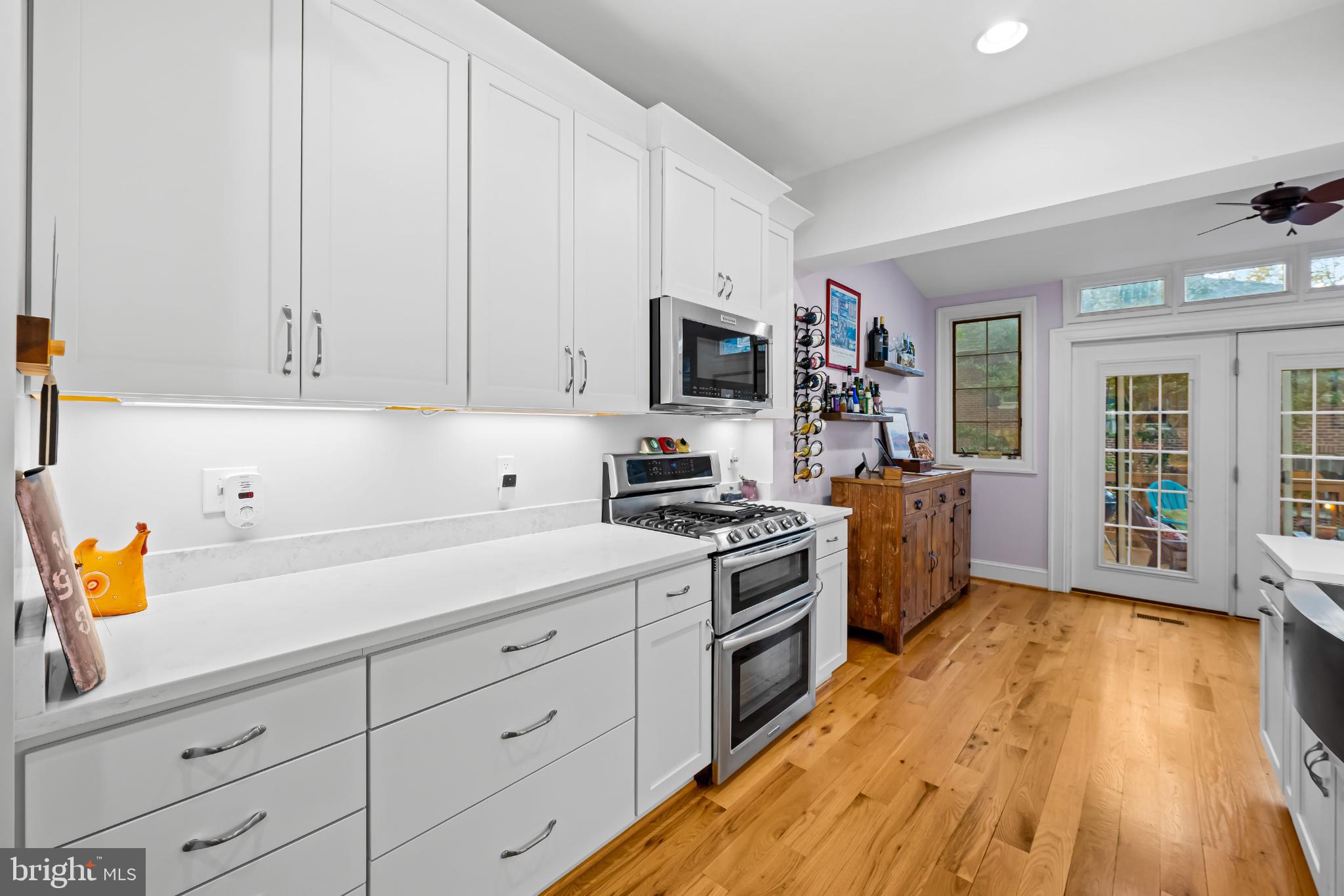 3932 Cloverhill Road Baltimore, MD 21218 - Photo 18 of 43 Kitchen with Fench Doors to Back Deck