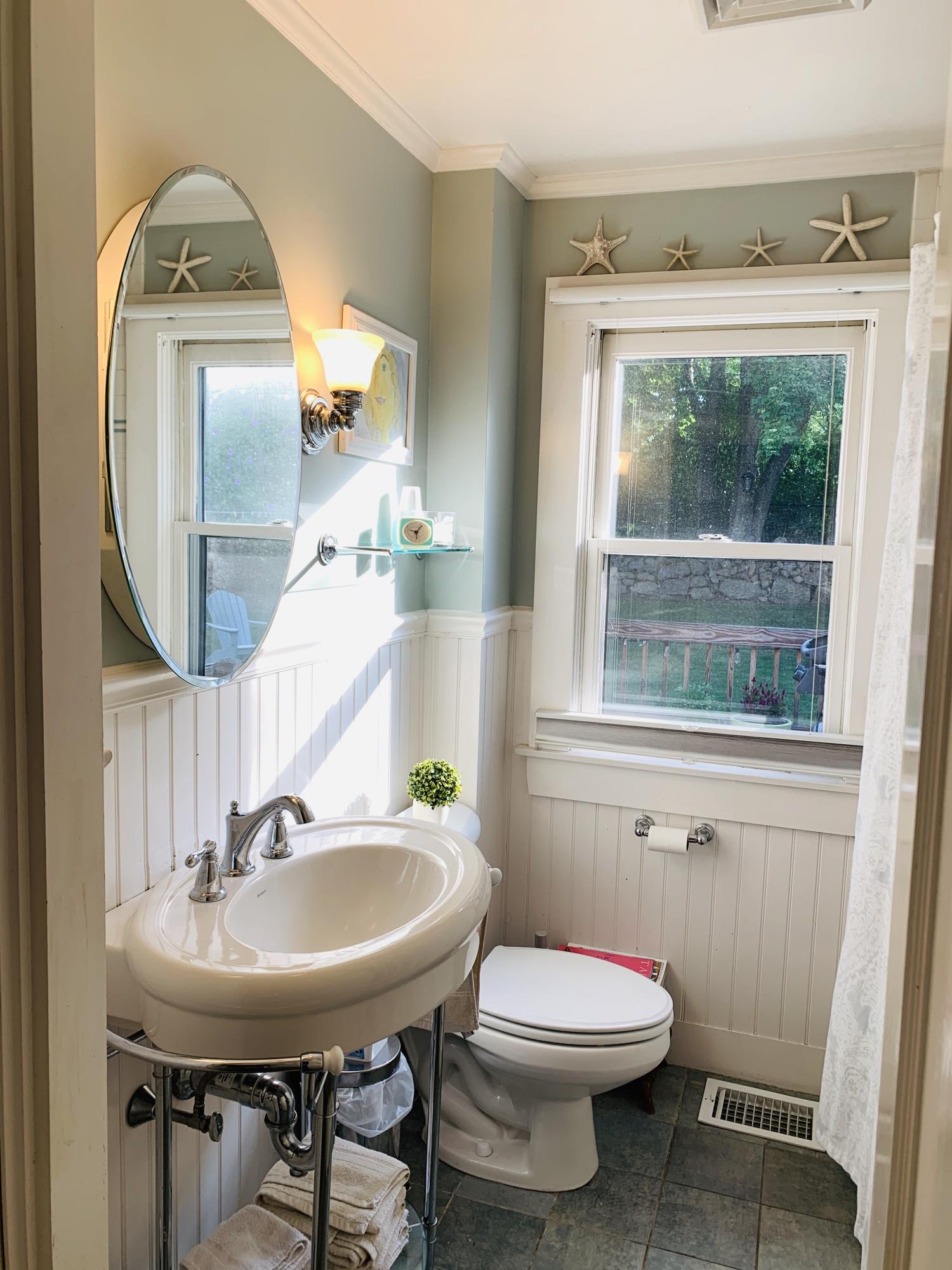8 Morse Avenue Wareham, MA 02571 - Photo 13 of 14 a bathroom with a sink and a mirror