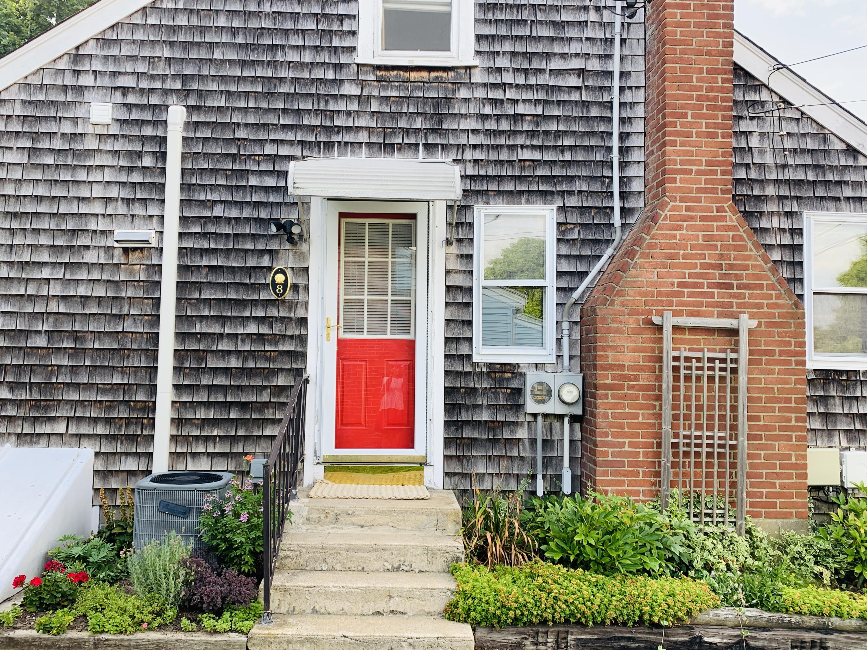 8 Morse Avenue Wareham, MA 02571 - Photo 14 of 14 a front view of a house with a garden