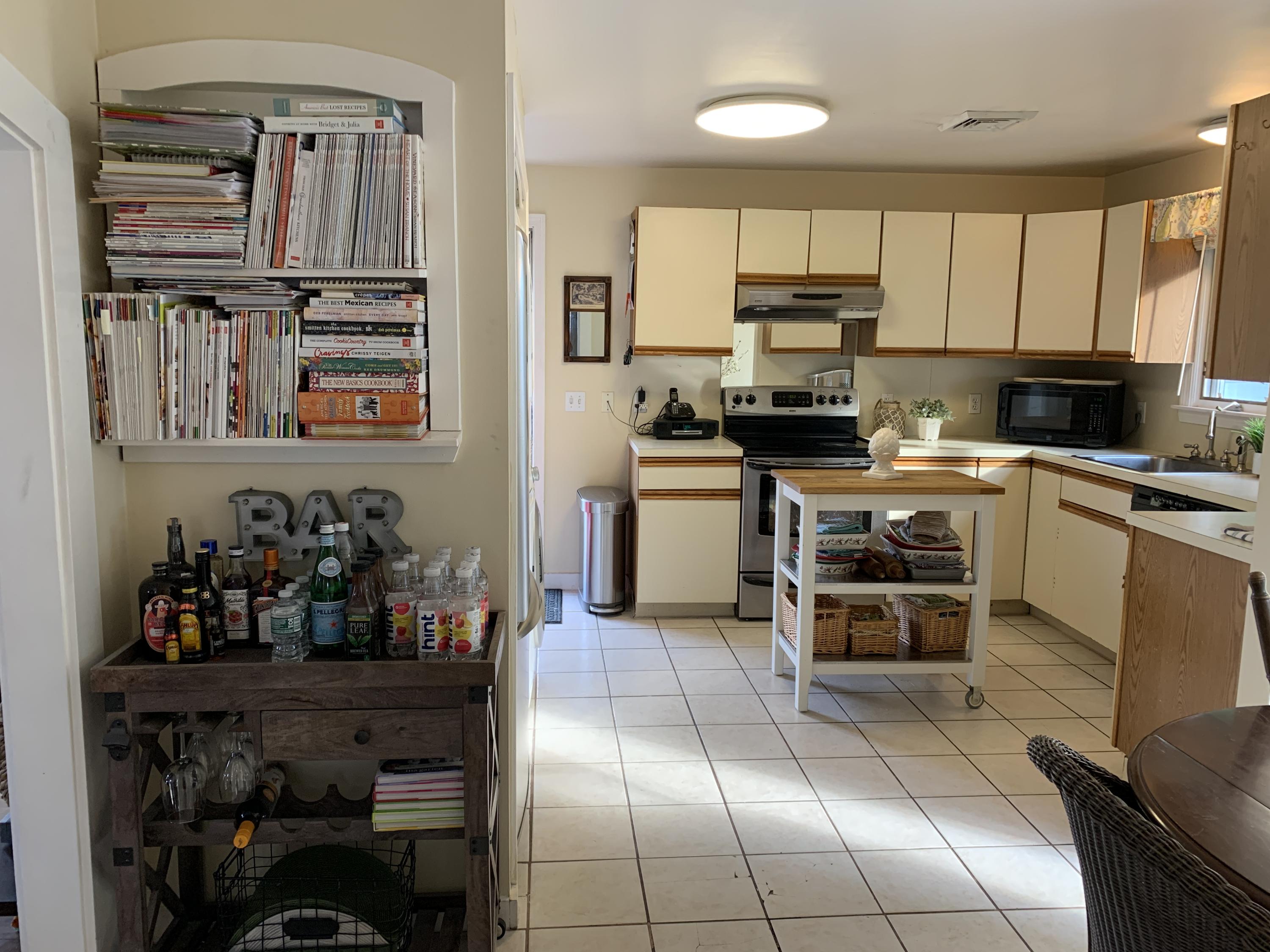 8 Morse Avenue Wareham, MA 02571 - Photo 8 of 14 a kitchen with stainless steel appliances granite countertop a refrigerator and stove