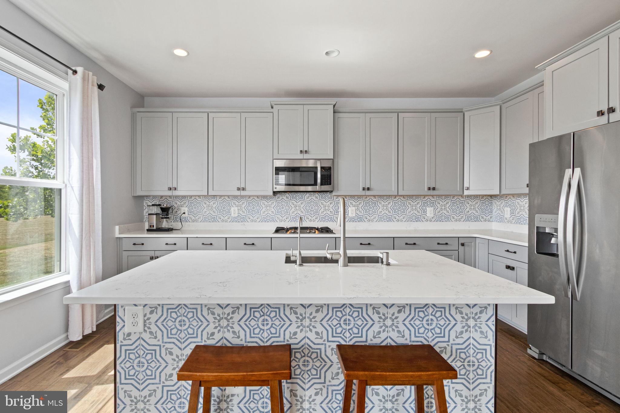 995 Aspen Road Stafford, VA 22554 - Photo 13 of 39 Bright kitchen with gray soft-close cabinetry