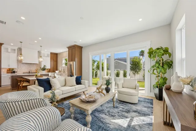 a bathroom with a shower sink and vanity