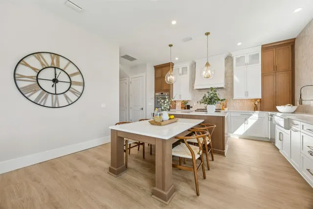 a spacious bedroom with a bed and large window