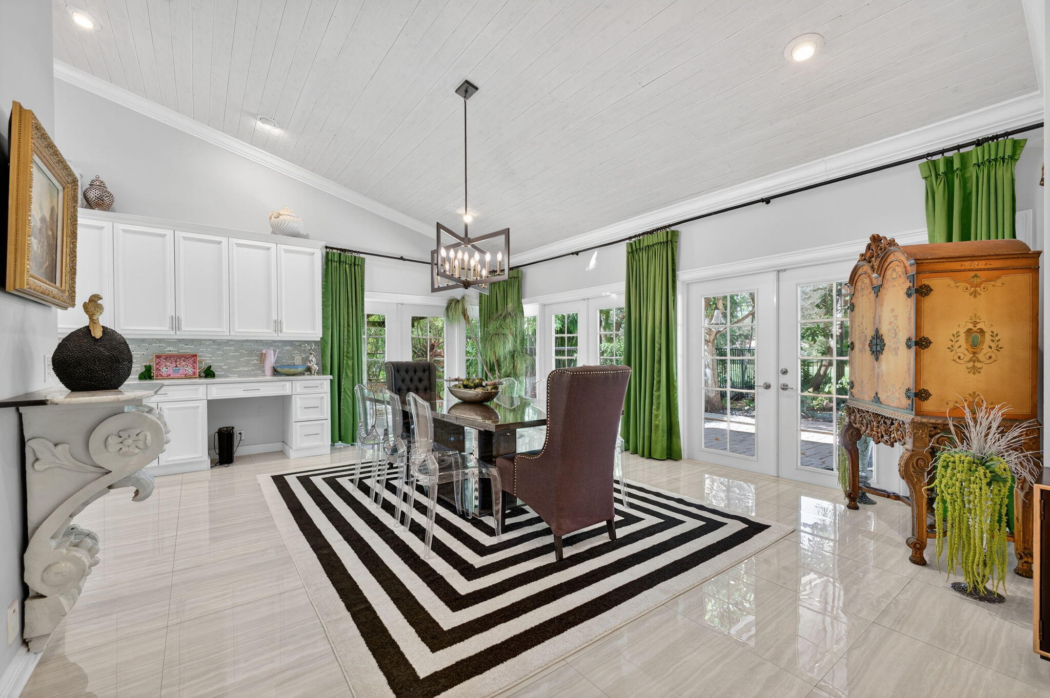 7205 Mandarin Drive Boca Raton, FL 33433 - Photo 14 of 71 a view of a dining room with furniture a rug and wooden floor