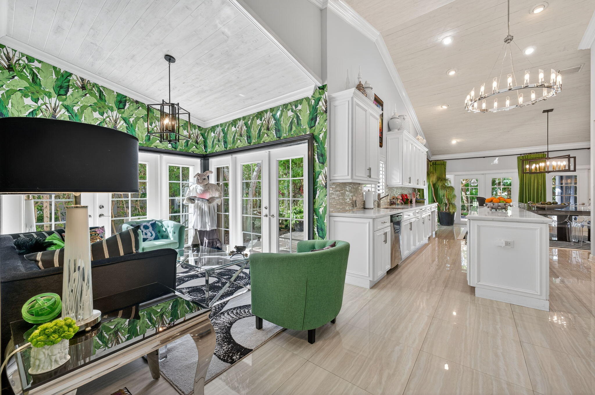 7205 Mandarin Drive Boca Raton, FL 33433 - Photo 20 of 71 a living room with furniture a flat screen tv and a large window