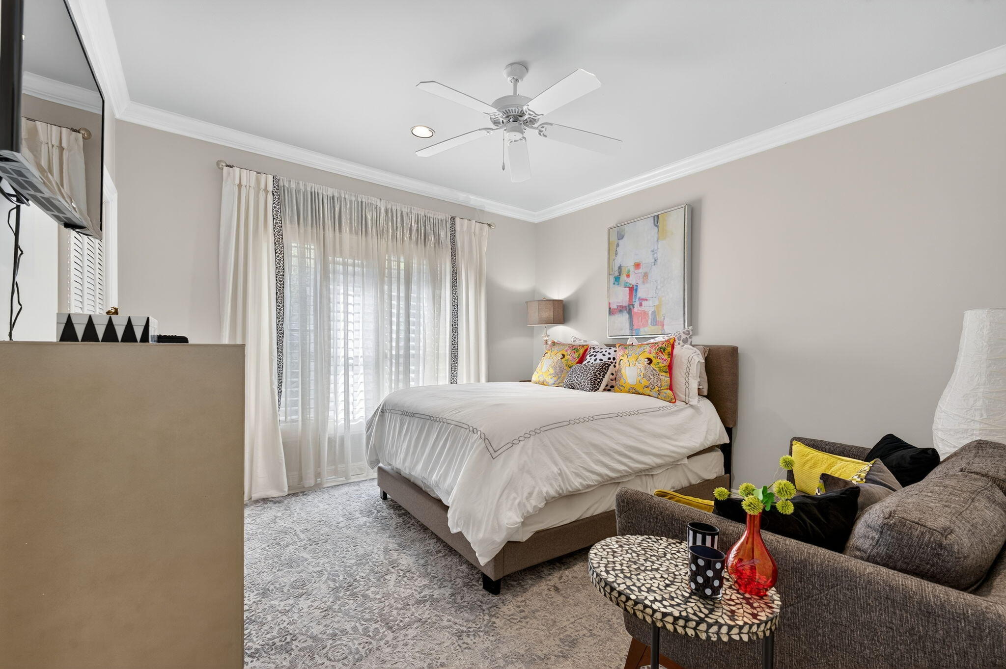 7205 Mandarin Drive Boca Raton, FL 33433 - Photo 22 of 71 a bedroom with a bed and ceiling fan