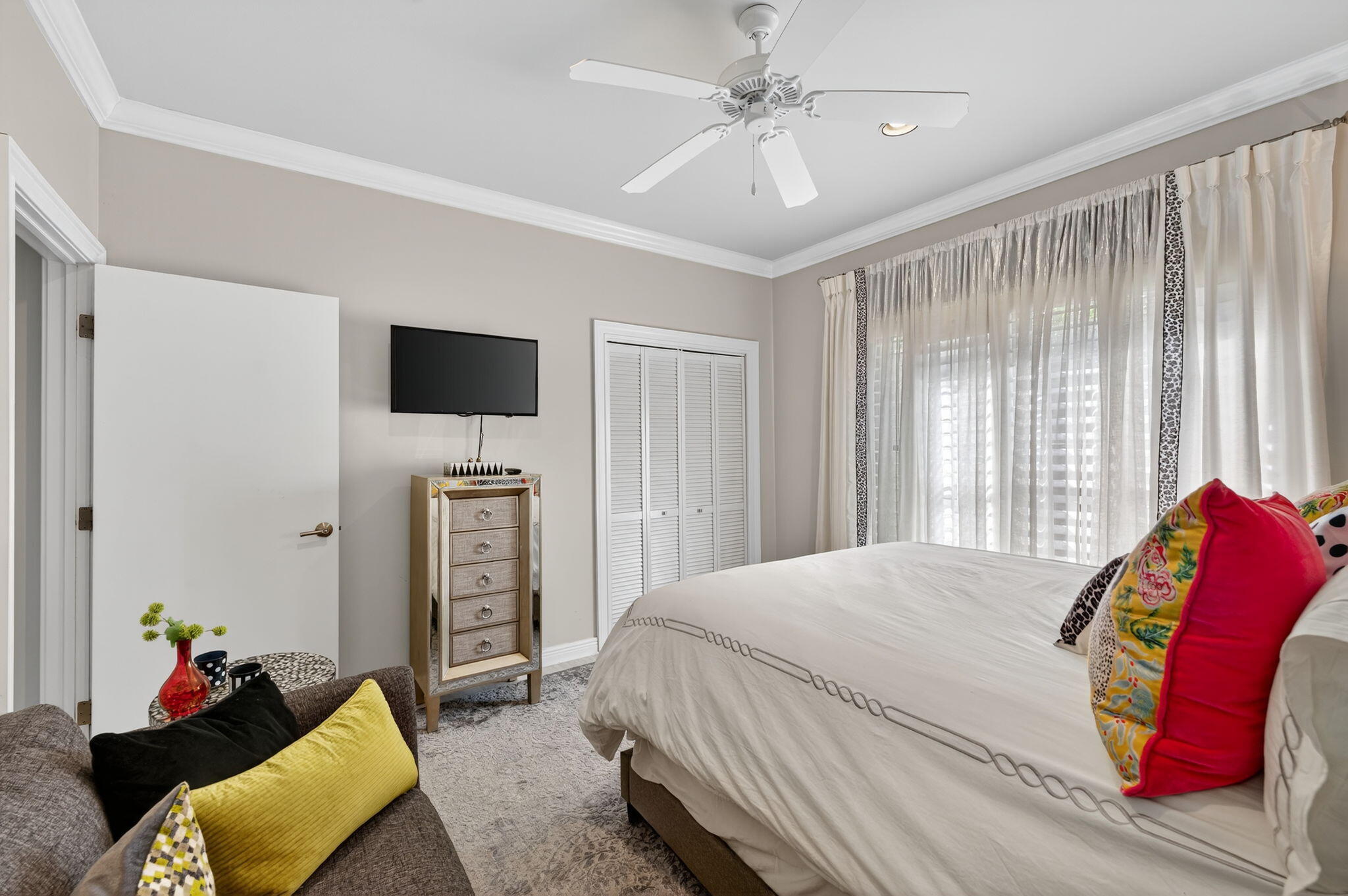 7205 Mandarin Drive Boca Raton, FL 33433 - Photo 23 of 71 a bedroom with a bed and a television