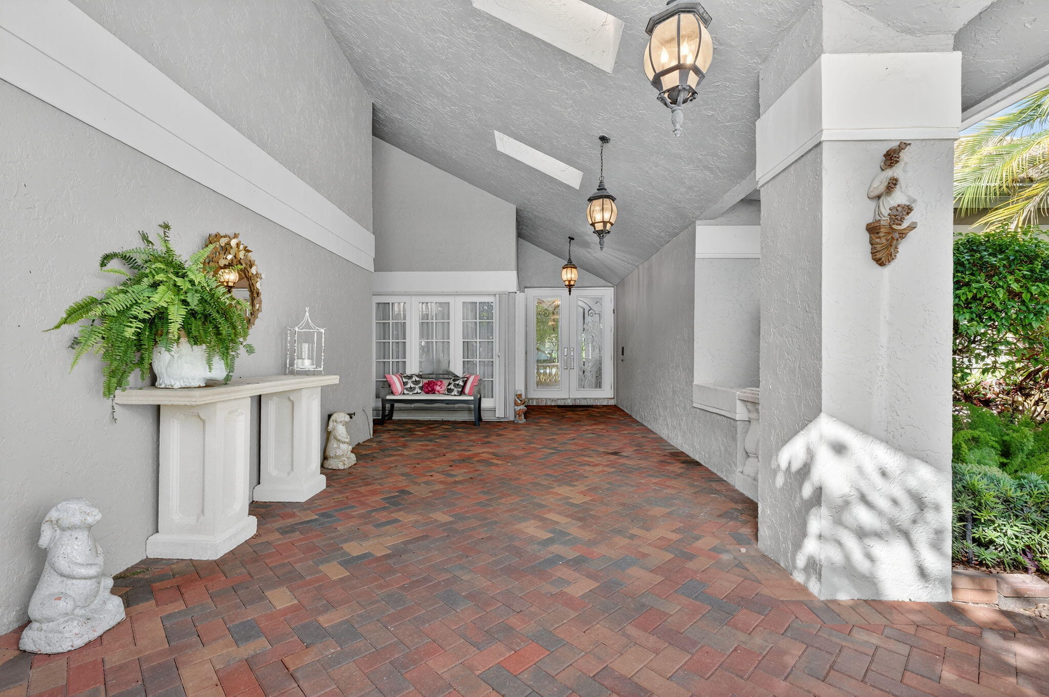 7205 Mandarin Drive Boca Raton, FL 33433 - Photo 3 of 71 a view of entryway with livingroom and chandelier