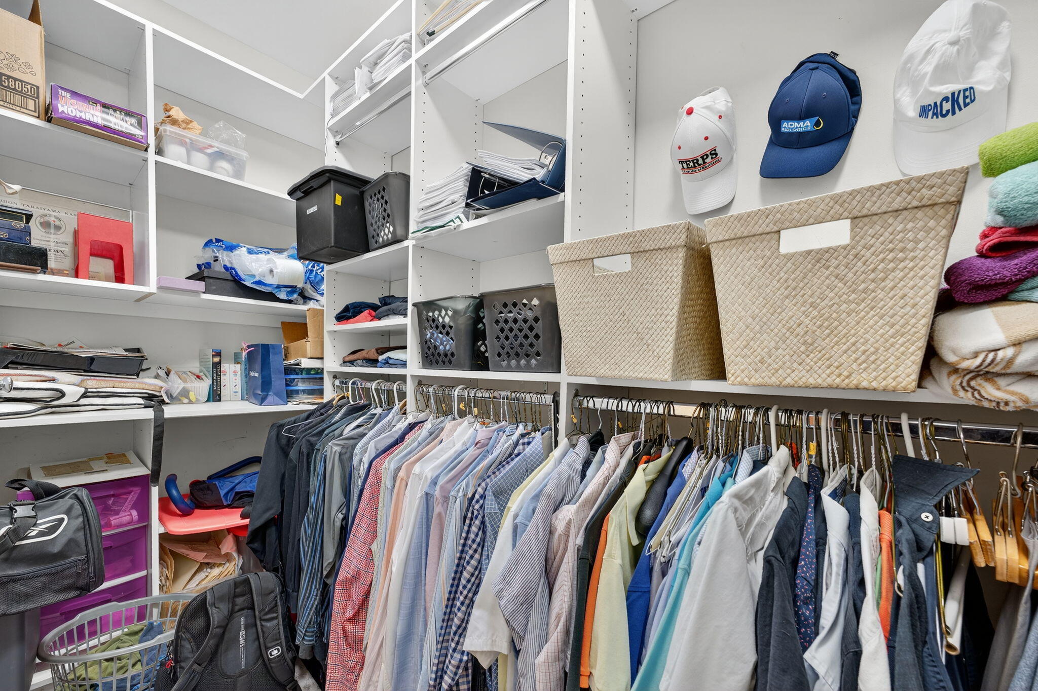7205 Mandarin Drive Boca Raton, FL 33433 - Photo 34 of 71 a view of walk in closet with clothes and shoes