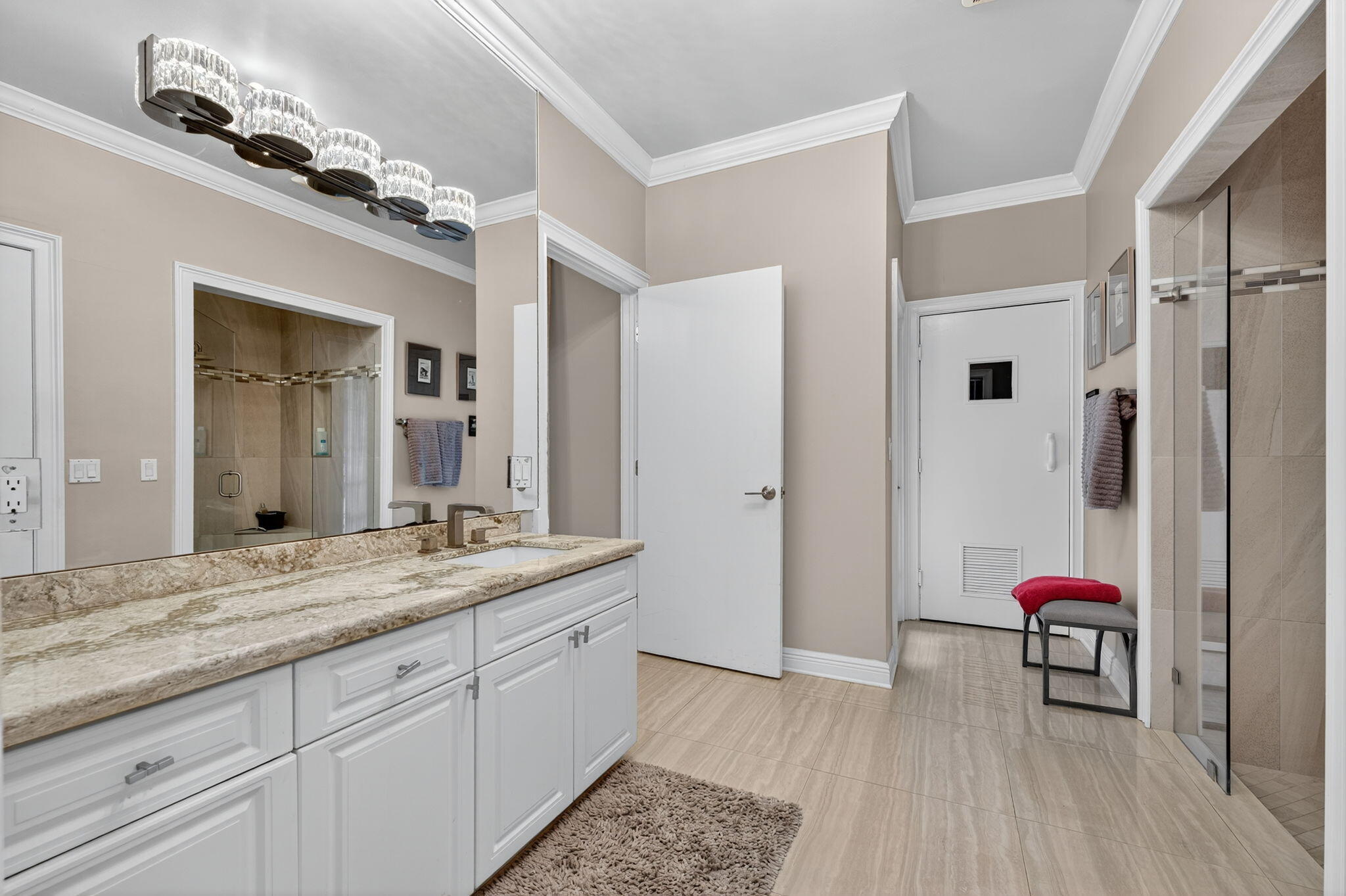 7205 Mandarin Drive Boca Raton, FL 33433 - Photo 35 of 71 a en suite bathroom with a granite countertop sink mirror and shower