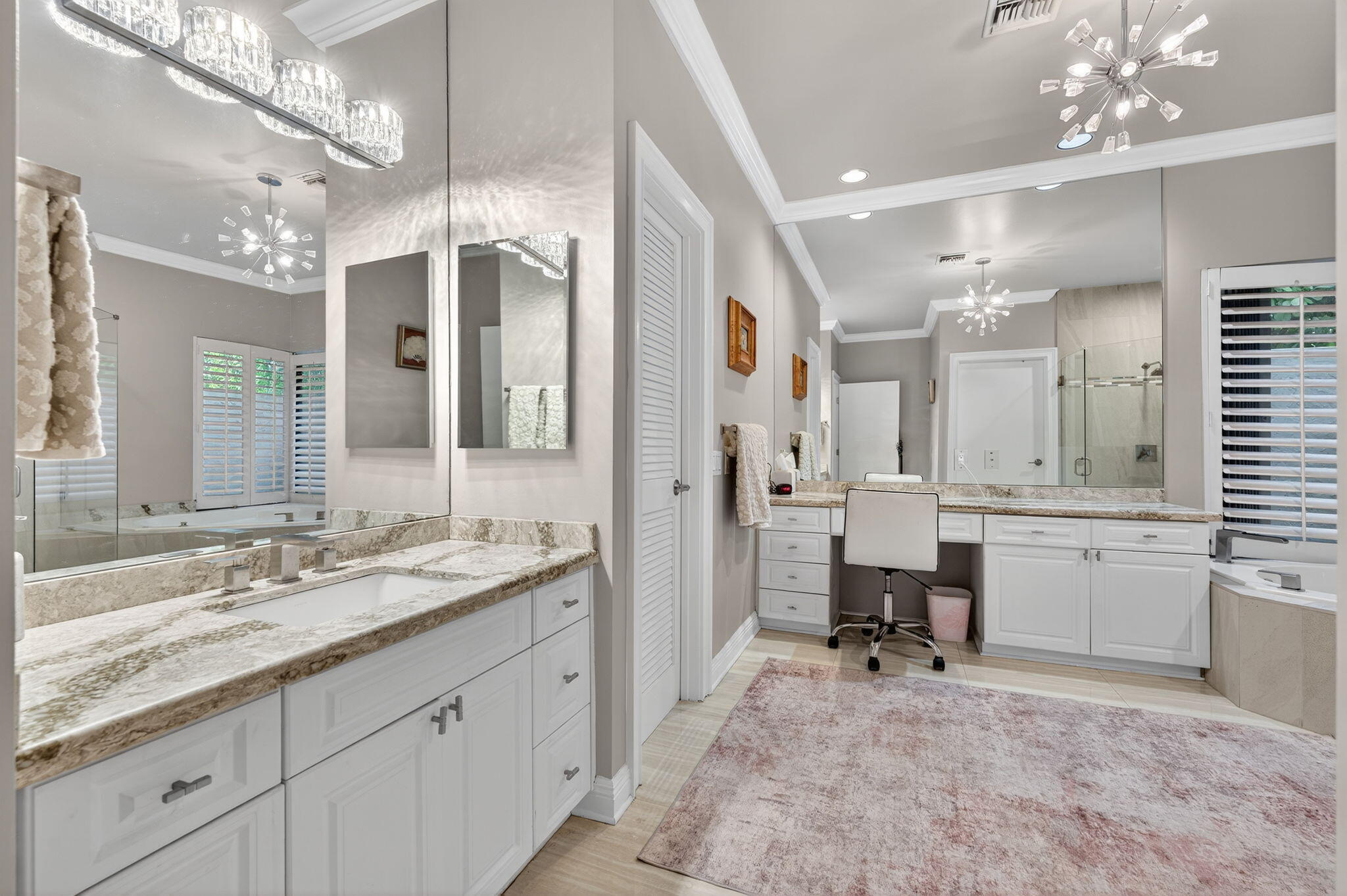 7205 Mandarin Drive Boca Raton, FL 33433 - Photo 36 of 71 a spacious bathroom with a double vanity sink mirror and a bathtub