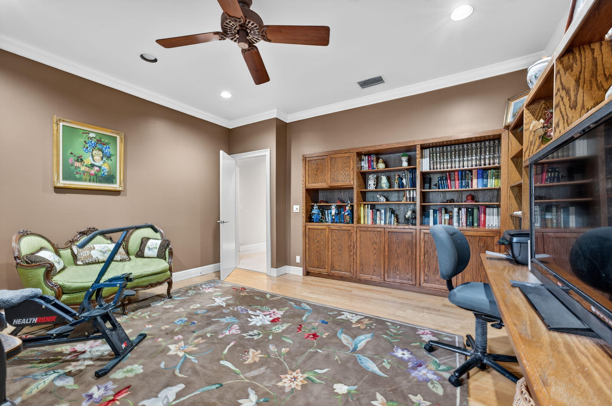 7205 Mandarin Drive Boca Raton, FL 33433 - Photo 43 of 71 a living room with furniture and a book shelf