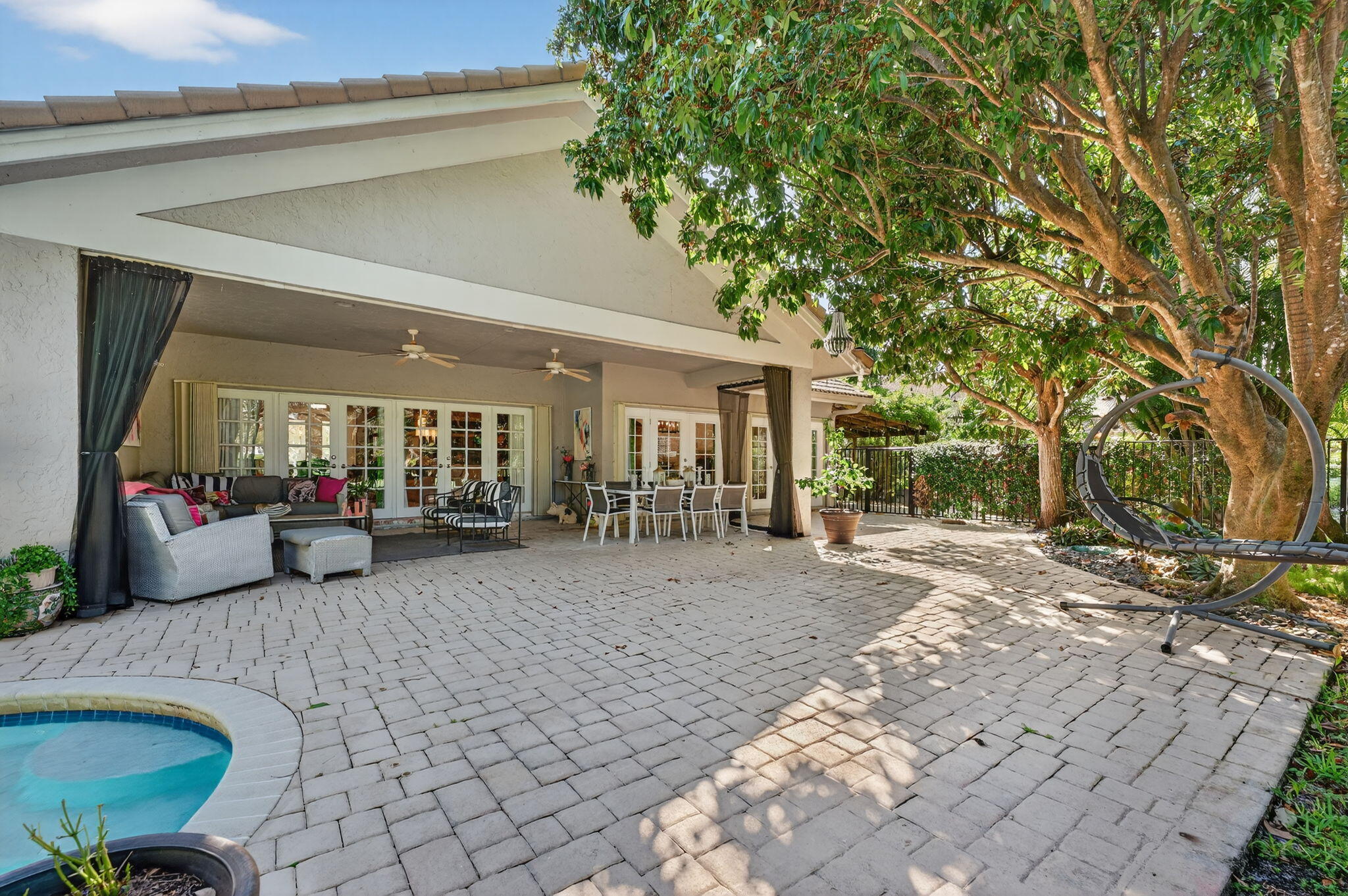 7205 Mandarin Drive Boca Raton, FL 33433 - Photo 53 of 71 a view of a livingroom with furniture and floor to ceiling window