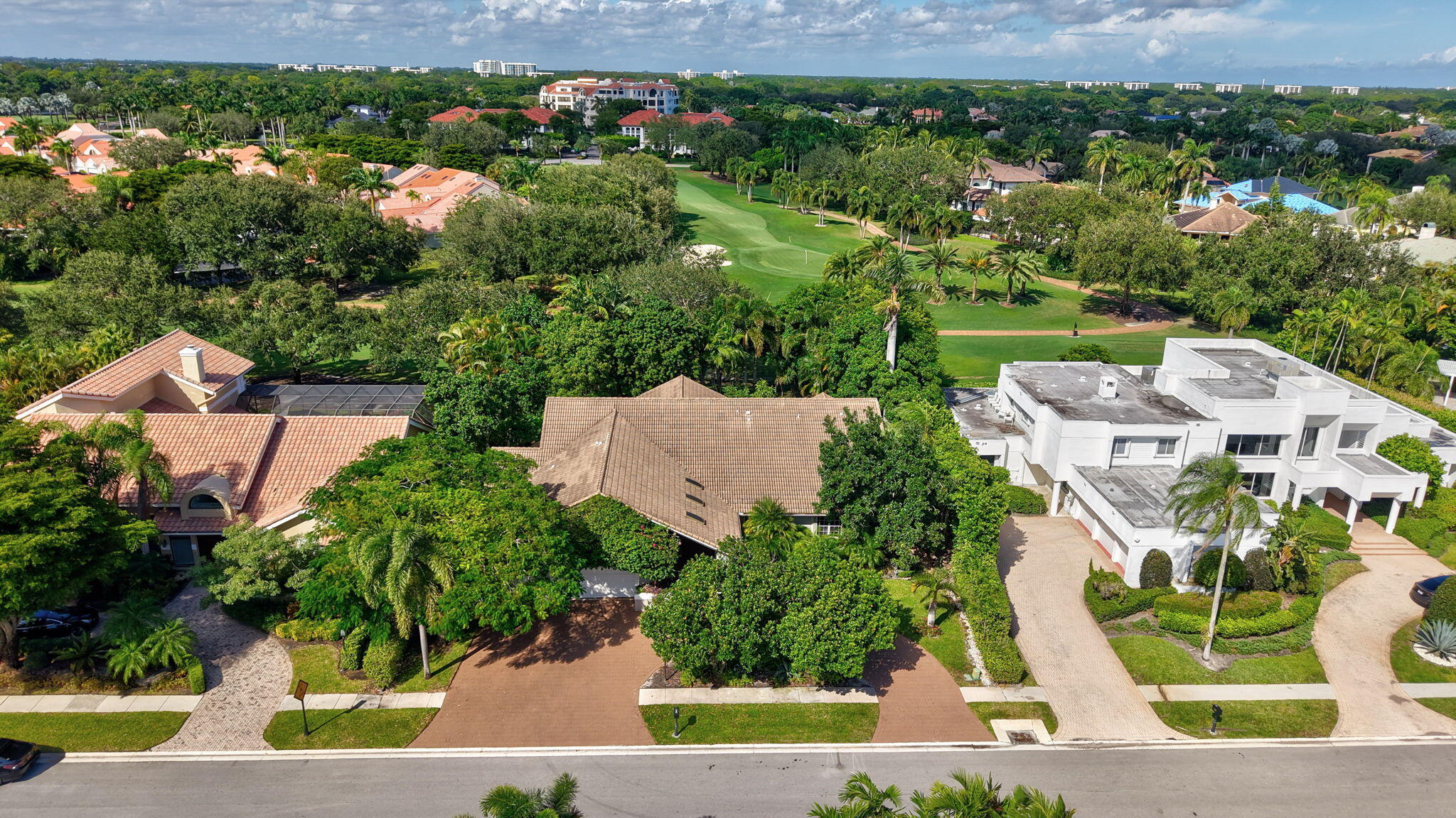 7205 Mandarin Drive Boca Raton, FL 33433 - Photo 60 of 71 an aerial view of a house with a yard and lake view