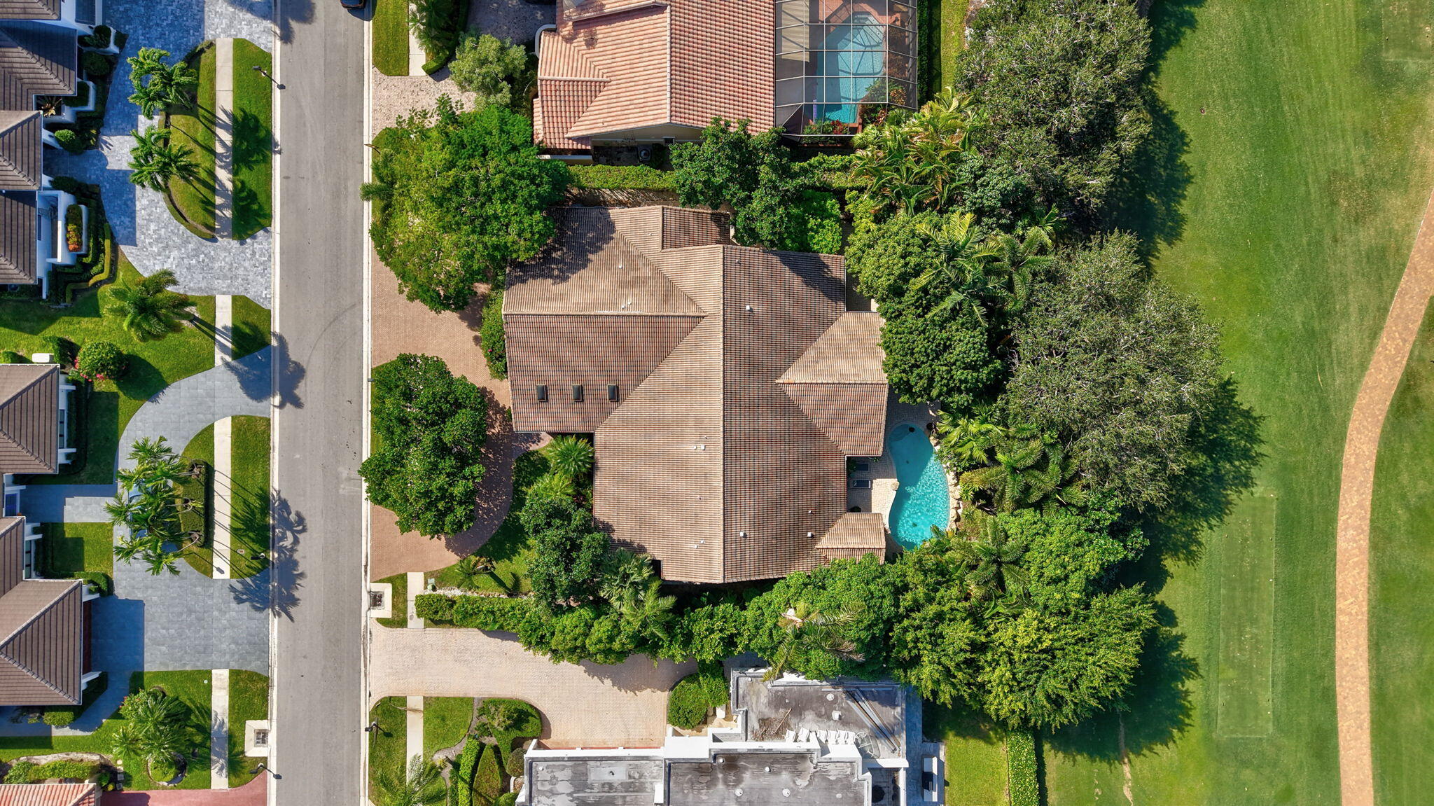 7205 Mandarin Drive Boca Raton, FL 33433 - Photo 66 of 71 an aerial view of a house with outdoor space and trees all around