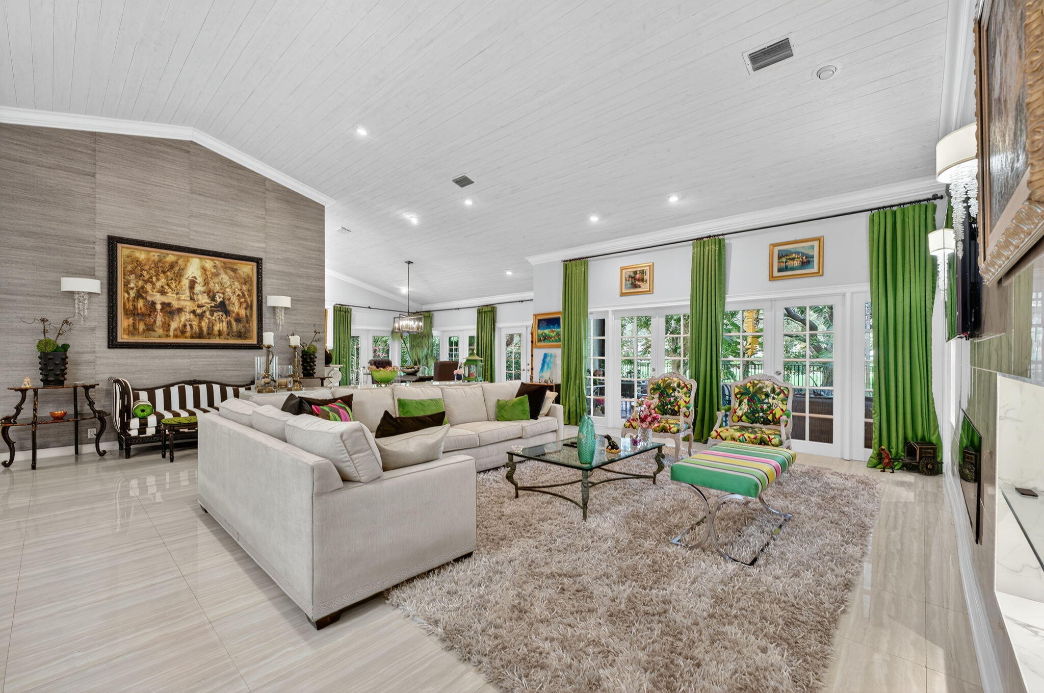 7205 Mandarin Drive Boca Raton, FL 33433 - Photo 7 of 71 a living room with furniture large window and flat screen tv