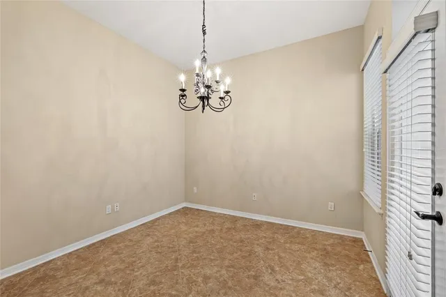 a view of a hallway with windows