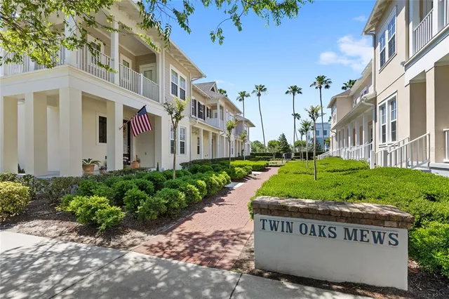 a view of a street with a building in the background