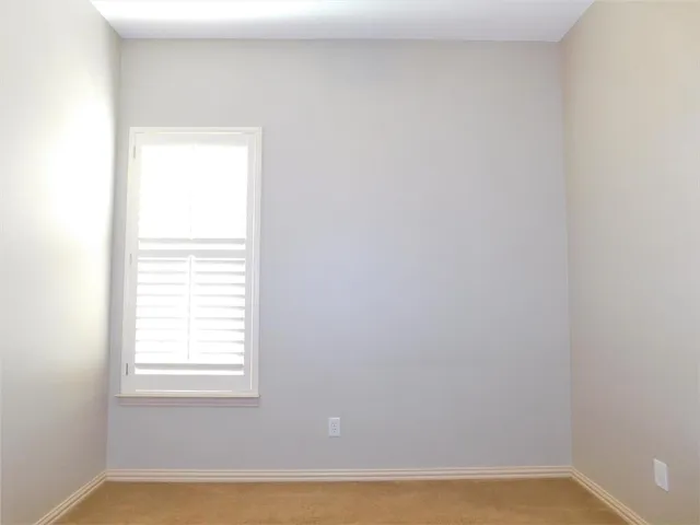 a view of a small space with a window