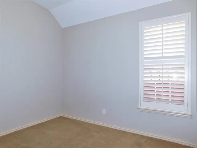a bathroom with a sink and cabinets