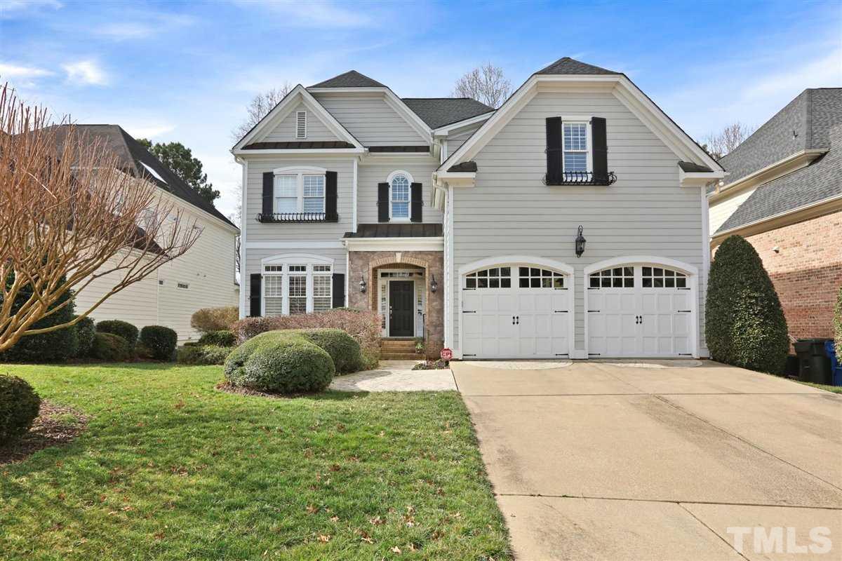 12317 Beestone Lane Raleigh, NC 27614 - Photo 1 of 30 a front view of a house with a garden