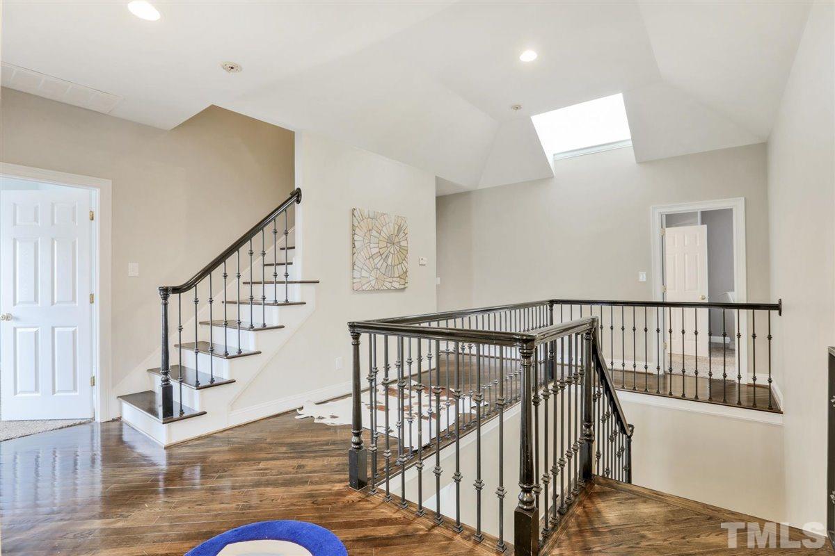 12317 Beestone Lane Raleigh, NC 27614 - Photo 25 of 30 a view of entryway with wooden floor