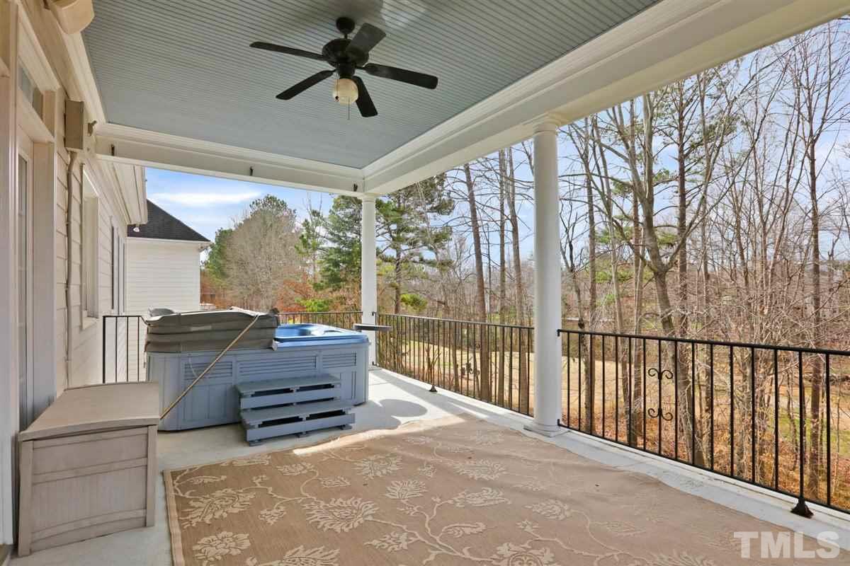 12317 Beestone Lane Raleigh, NC 27614 - Photo 7 of 30 a backyard of a house with sofas table and sofas