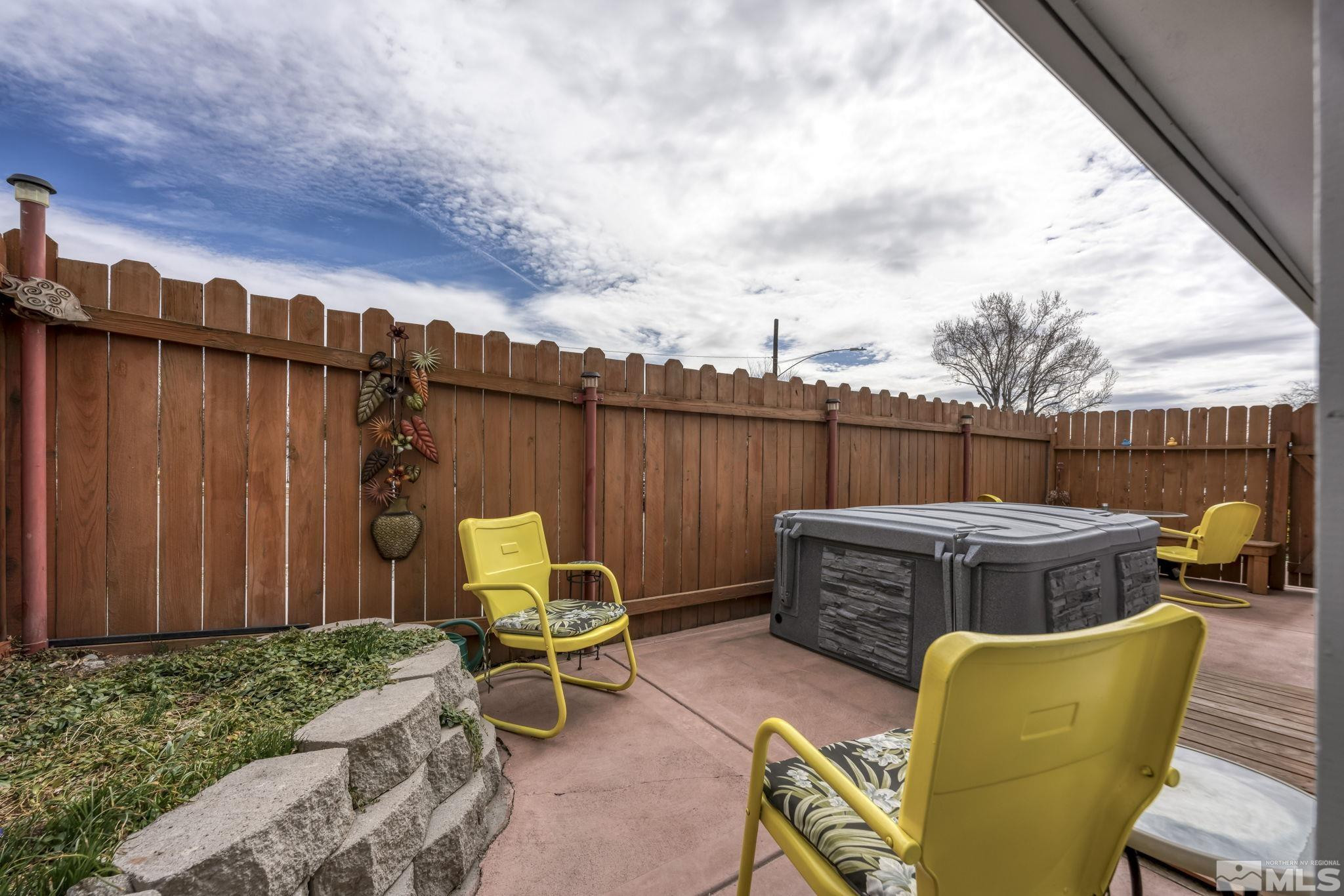 595 Roberts Street Reno, NV 89502 - Photo 22 of 24 a backyard of a house with a table and chairs