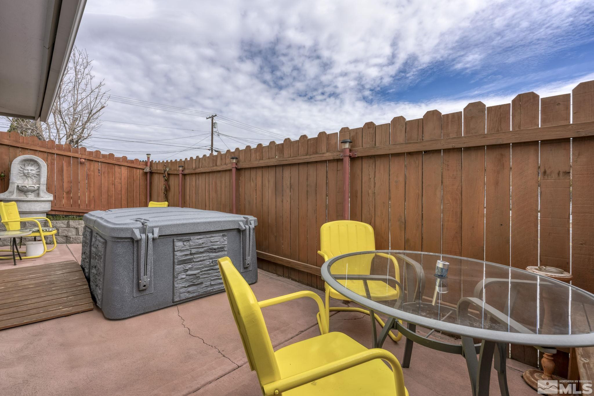 595 Roberts Street Reno, NV 89502 - Photo 23 of 24 a view of a backyard with a tub and chairs