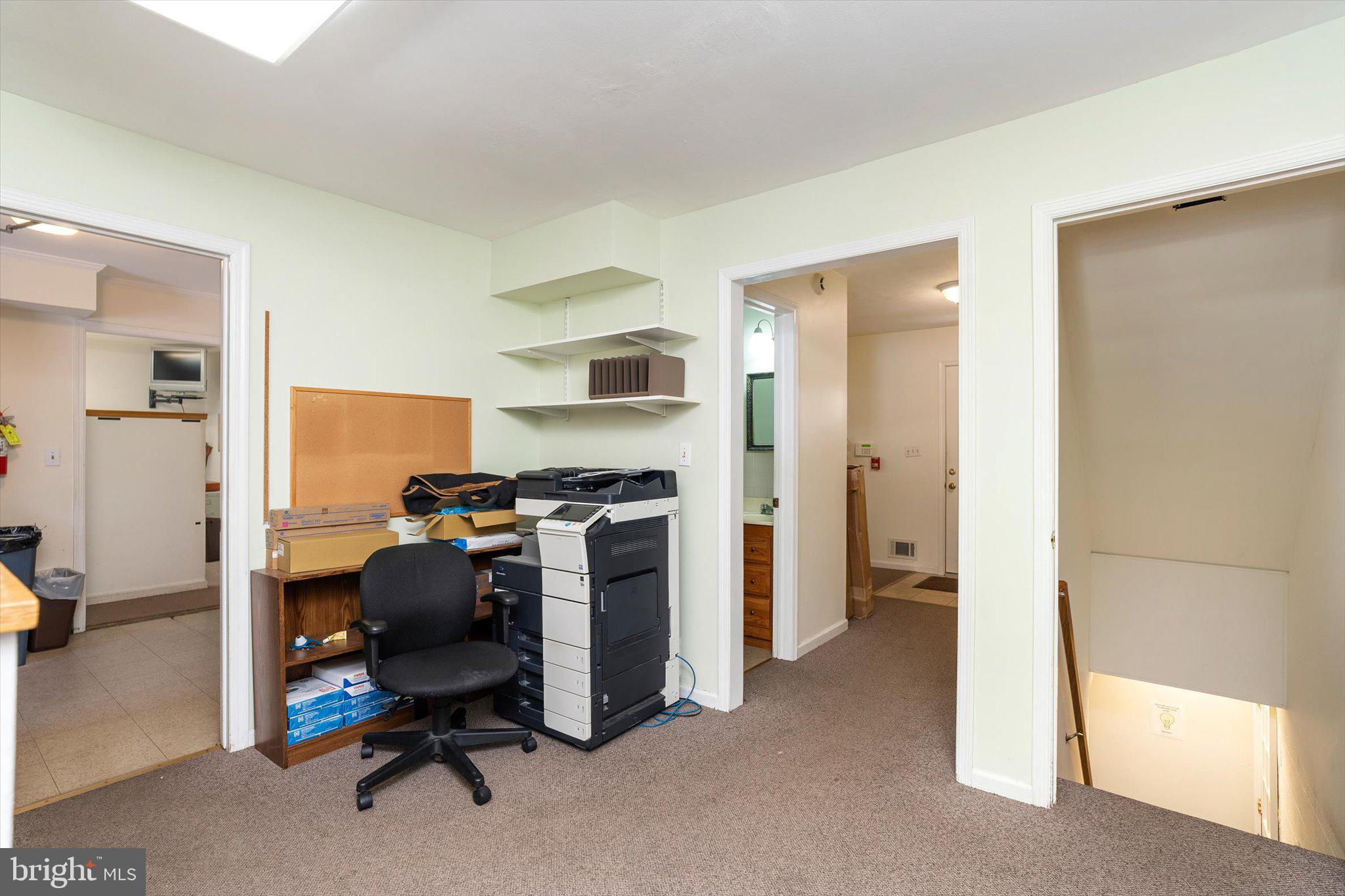 53 North Post Road Princeton Junction, NJ 08550 - Photo 17 of 33 a view of a workspace with furniture and a bedroom