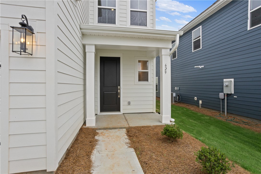 629 Sweetspire Trail, Unit 149 Seneca, SC 29678 - Photo 27 of 30 A welcoming covered entry portico invites residents to this contemporary home with sleek siding.