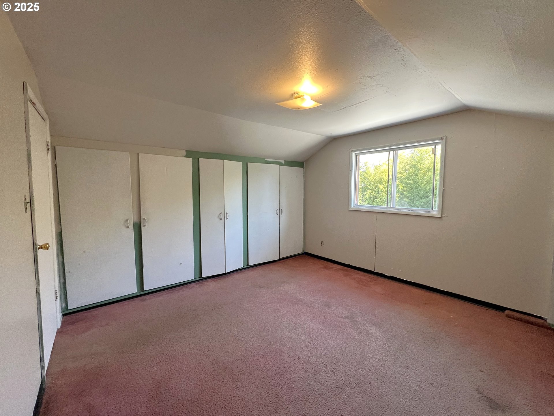 1042 Fir Avenue Reedsport, OR 97467 - Photo 23 of 47 an empty room with windows