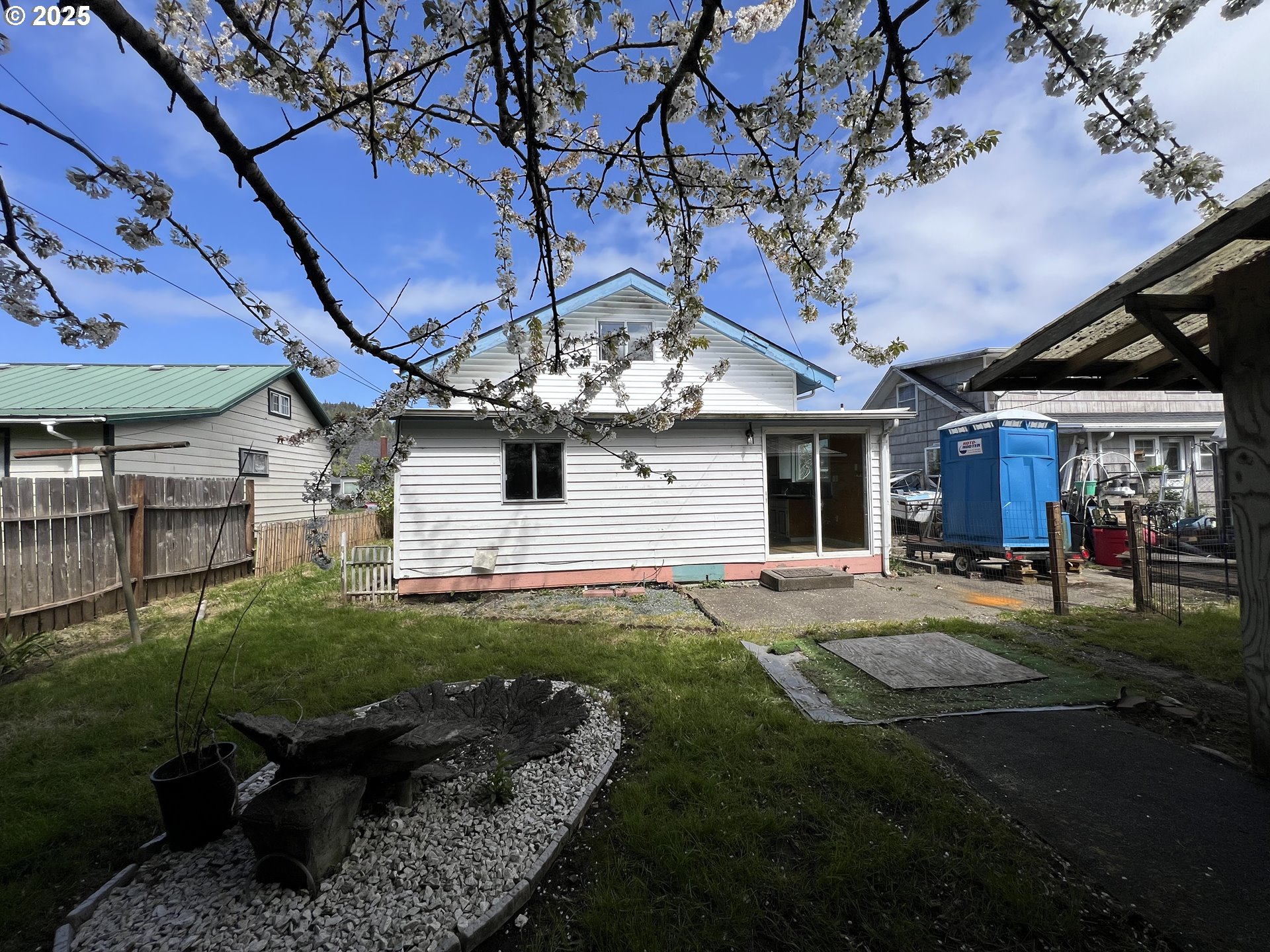 1042 Fir Avenue Reedsport, OR 97467 - Photo 45 of 47 a view of a house with backyard and porch