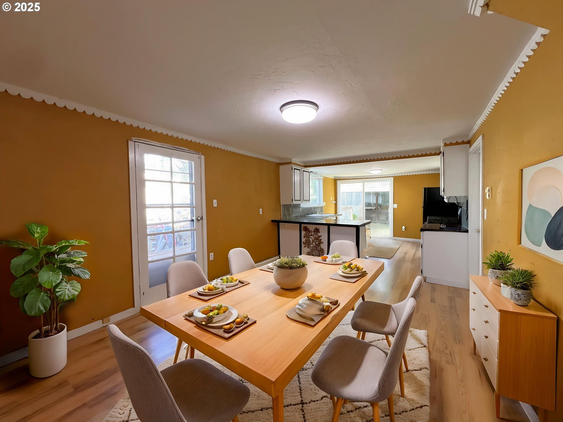 1042 Fir Avenue Reedsport, OR 97467 - Photo 10 of 47 a view of a dining room with furniture window and wooden floor