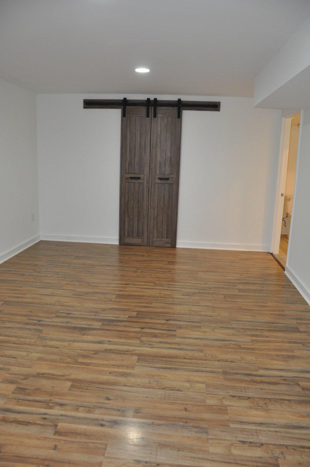 28 Henry Way Linden, VA 22642 - Photo 24 of 39 a view of an empty room with wooden floor